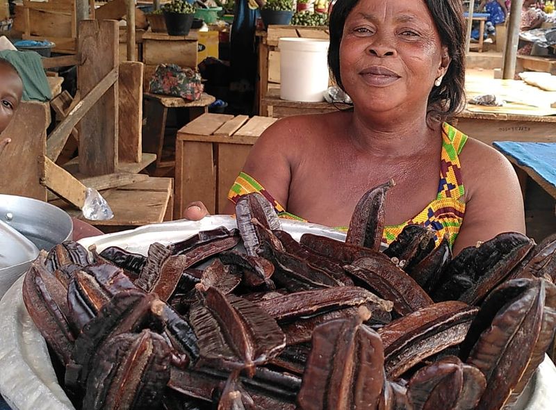 Groepsreis Ghana marktkramer