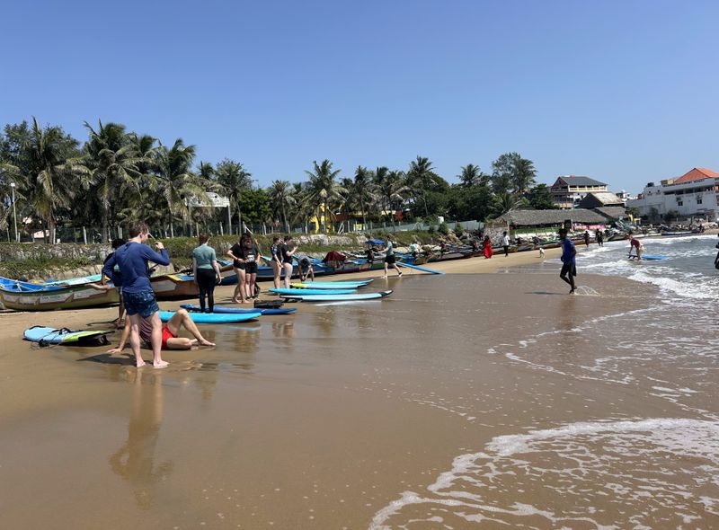 Zuid-India groepsreis surfles op het strand