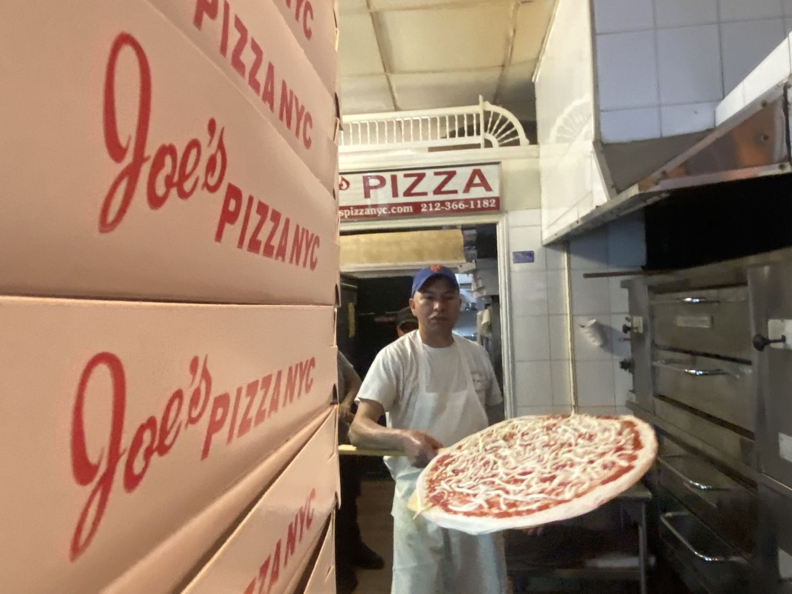 Joe's Pizza Pizza in the making