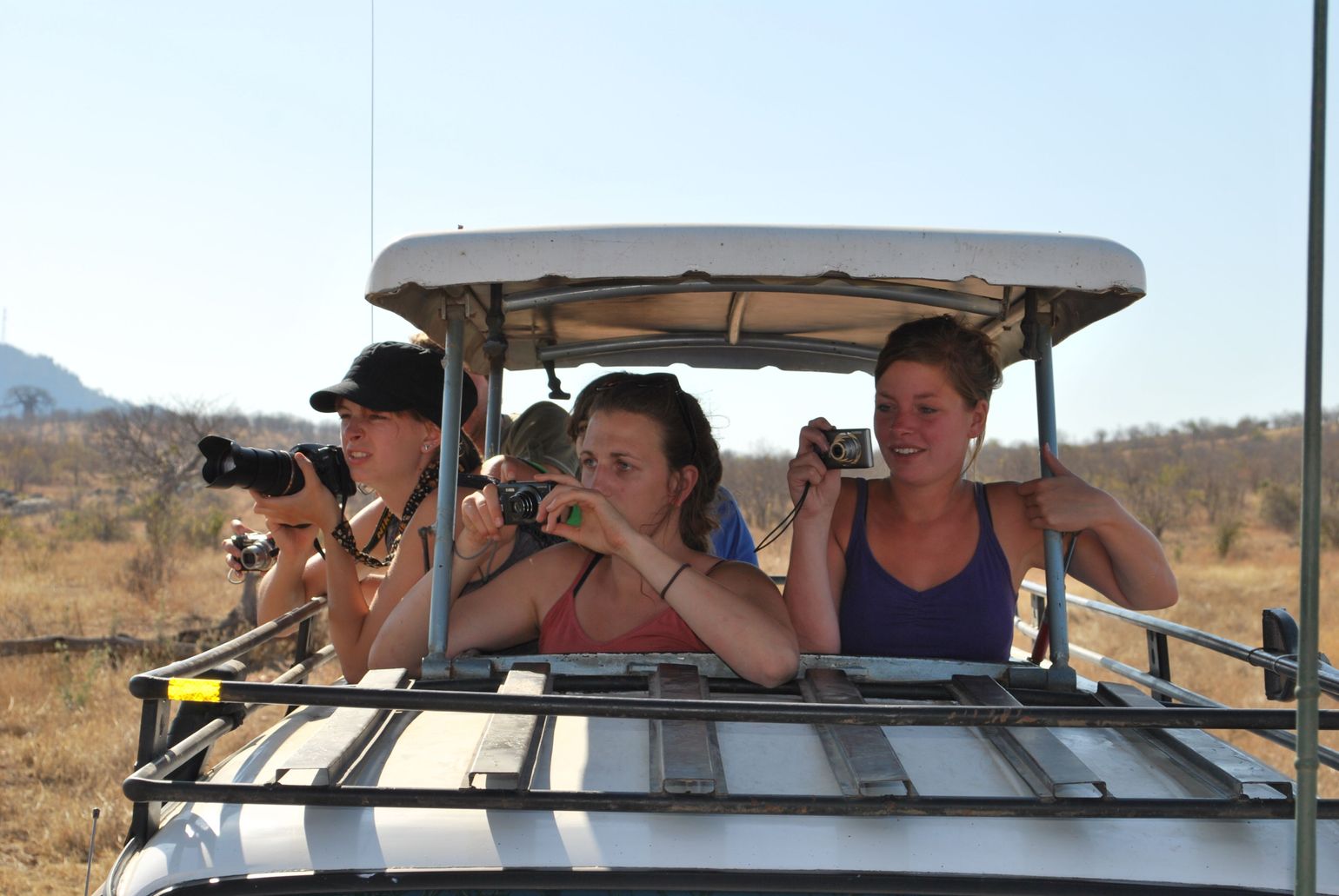 Safari meisjes met fototoestellen