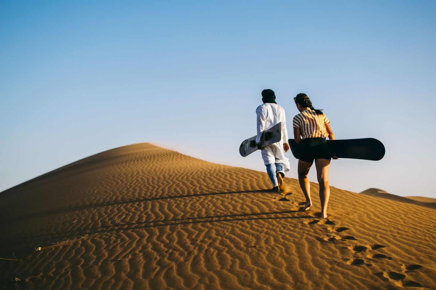 Groepsreis Marokko woestijn sandboarden
